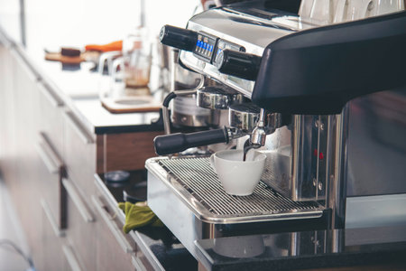 Black cup fresh coffee machine espresso barista beverage appliance froth bar cappuccino professional automatic equipment. Coffee aromatic drinking appliance freshness coffee machine home kitchenの写真素材