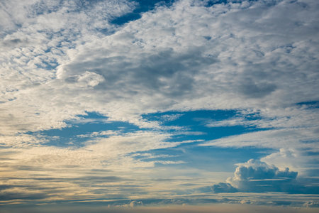 Tropical summer blue sky fluffy white cloud summertime on light sunny day cloudscape. Clear bright blue skyline spring sunlight climate background. Heaven blue environment ecology high scenic nature.の写真素材