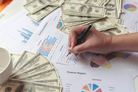 Businessman hands working Excel graph Spreadsheet Document showing business Infographic Financial summary report. Financial Plan Data Accounting Database Report. Business Graphs chart office deskの写真素材