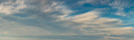 Banner summer blue sky fluffy white cloud summertime on light sunny day cloudscape. Panoramic Clear bright blue skyline spring sunlight climate background. Heaven blue ecology for web bannerの写真素材