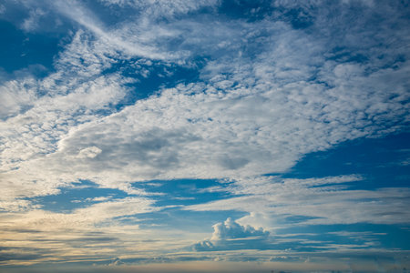 Tropical summer blue sky fluffy white cloud summertime on light sunny day cloudscape. Clear bright blue skyline spring sunlight climate background. Heaven blue environment ecology high scenic nature.の写真素材