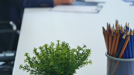 Meeting room Office laptop business financial document chart , graph on wooden table with coffee cup. Flat lay notebook computer laptop on office desk. No people business graph chart on meeting tableの写真素材
