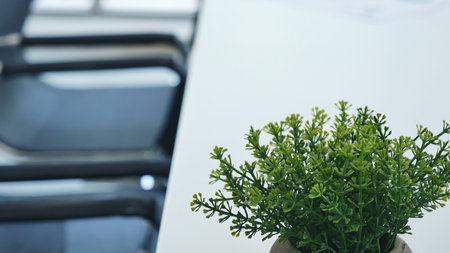 Meeting room Office laptop business financial document chart , graph on wooden table with coffee cup. Flat lay notebook computer laptop on office desk. No people business graph chart on meeting tableの写真素材