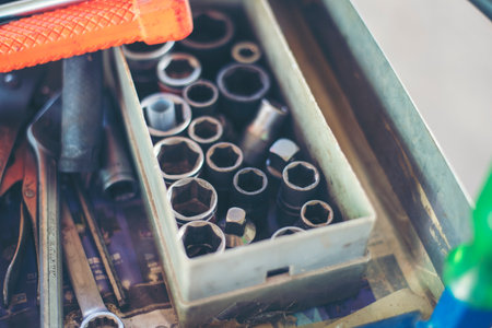Mechanic tools engineering equipment car auto repair shop with copy space. Blurred background...