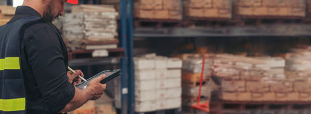 Banner Close up Hispanic men hands using pen touch smart tablet Warehouse management logistics counting checking products on inventory shelf. Man hands worker check stock control with copy spaceの写真素材