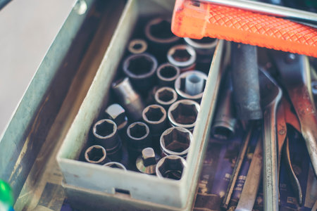 Heavy screw grungy rusted wrenches dirty screwdriver object. Industrial hardware set. Mechanic tools engineering equipment car auto repair shop with copy space. Blurred background mechanical serviceの写真素材