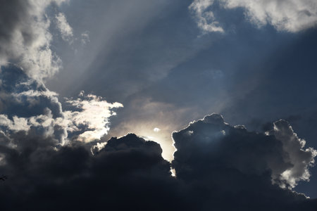 Dramatic dark storm thundercloud rain clouds on black sky background. Dark thunderstorm clouds...