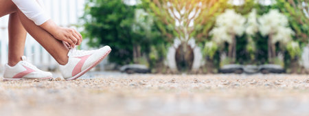 Banner Woman traveller walking on road relaxation. Women wear sneaker shoes walking summer park....