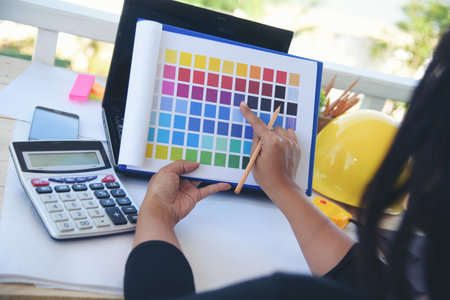 Woman engineer hands working at office desk architecture. Women engineer hands drawing architect...