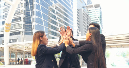 Diversity Teamwork business people friendship holding hands together. Multiethnic Businesspeople...