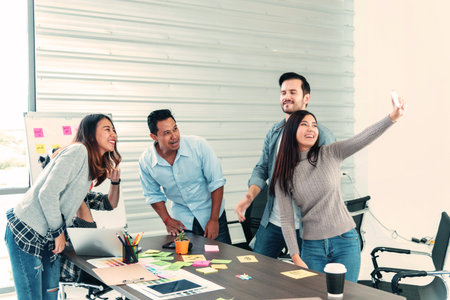 Happy business people holding money and throw in the air celebrate happiness dance wealth money rain...