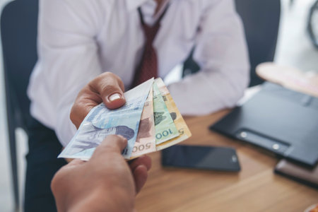 Close up hands giving money payment. Hands holding dollar bill financial economy business people....