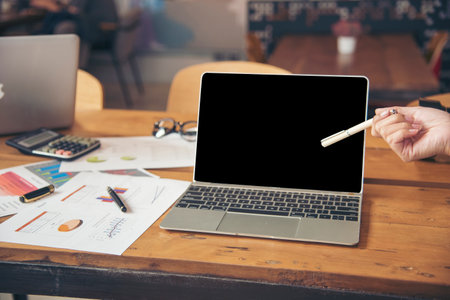 Close up woman hands typing keyboard using computer at home office. Unrecognizable person hands working at home type keyboard online working at home. Businesswoman using internet social media personの写真素材