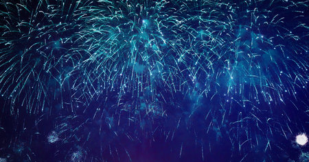 blue Firework celebrate anniversary happy new year 2024, 4th of july holiday festival. blue firework in night time celebrate national holiday. Countdown to new year 2025 festival party time eventの写真素材