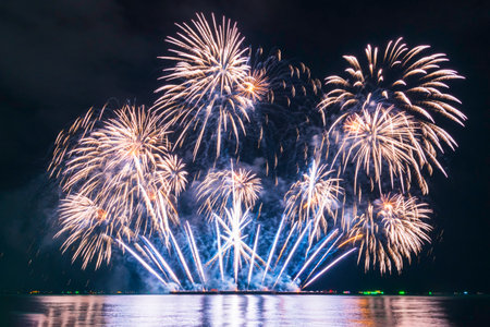 Blue Firework celebrate anniversary happy new year 2024, 4th of july holiday festival. blue firework in night time celebrate national holiday. Countdown to new year 2025 festival party time eventの写真素材