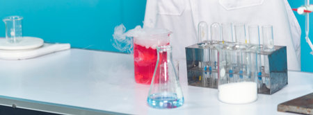 Banner Science chemistry glass tubes object on lab background. Wide Liquid tube biology laboratory chemical fluid scientist object medical glass tubes. Chemistry scientific background with Copy Spaceの写真素材