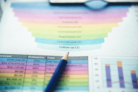 Excel graph with Spreadsheet Document showing Information Financial Startup Concept. Financial Planning making Accounting Database Report. Graphs and chart on screen with stationery set business stuffの写真素材