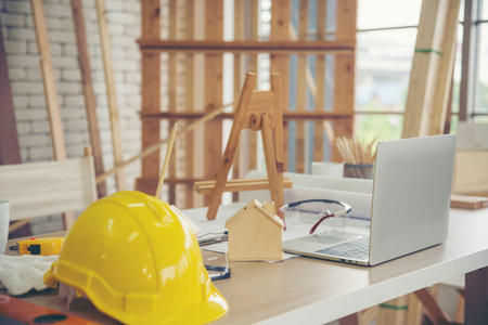 Banner construction engineer office desk architect workplace. Banner engineer draw blueprint objects table hard hat engineering stuff on desk. Designer Objects draft workplace table with copy spaceの写真素材