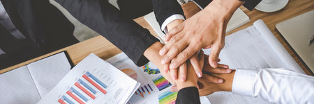 Banner Partners hands together teamwork group of business people meeting in firm company office. Panorama Diversity Hands join empower partner teams connection Mergers acquisitions social communityの写真素材