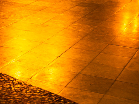 Gold texture design element blurred background glittering. Golden pattern backdrop decoration with copy space. Magic yellow orange shiny glowing selective focus. Glamour effect gold antique defocusedの写真素材