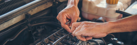 Banner Mechanic man hands repairing car shop. Man hands fixing Car machinery vehicle mechanical...