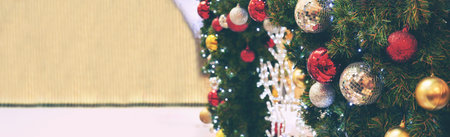 Colourful glittering baubles ornament ball decorated christmas tree on holiday winter xmas happy new...