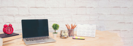 Banner Meeting room Office laptop business financial chart graph coffee cup in conference room. Panorama Flatlay office supply laptop desk. Business graph chart on meeting table with copy spaceの写真素材