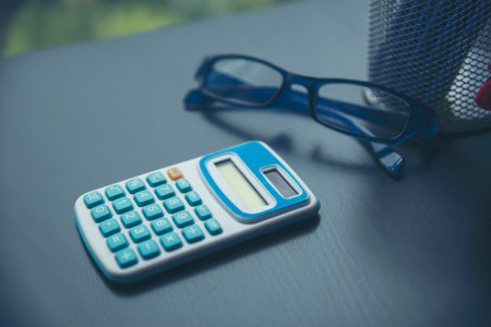 Spreadsheet Document showing Financial Startup Concept. Financial Planning making Accounting Database Report. Graphs and chart on screen with stationery set business stuffの写真素材