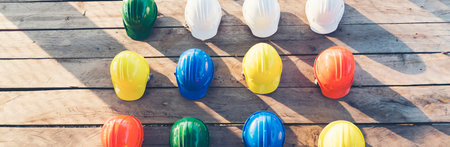 Banner Construction hard hat safety tools equipment for workers in construction site for engineering protection head standard. Panorama Many hard hat helmet on row copy space. Engineer Constructionの写真素材