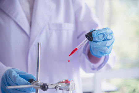 Close up Scientist woman holding chemical test glass tube testing science laboratory. Crop Lab...