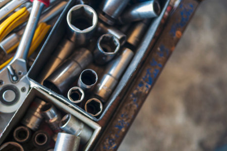 Mechanic tools engineering equipment car auto repair shop with copy space. Blurred background mechanical service. Heavy screw grungy rusted wrenches dirty screwdriver object. Industrial hardware setの写真素材