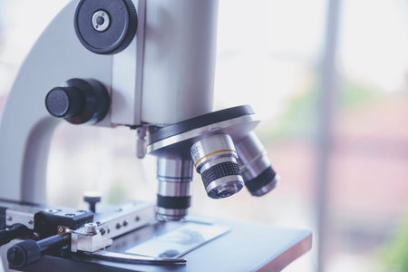 Science microscope equipment in biology chemical laboratory. Scientific experiment Microscope on Lab...