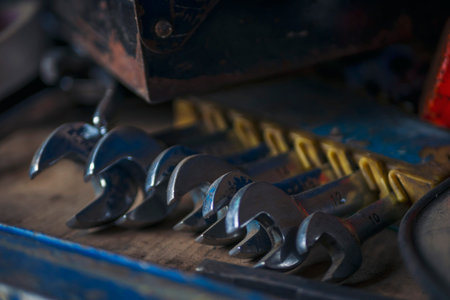 Mechanic tools engineering equipment car auto repair shop with copy space. Blurred background...