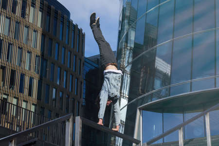 Young male athlete risk own life doing stunt tricksの写真素材