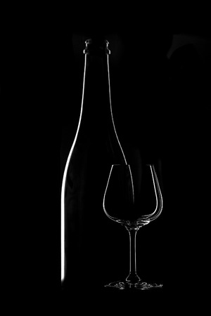 Glass of wine and bottleの写真素材