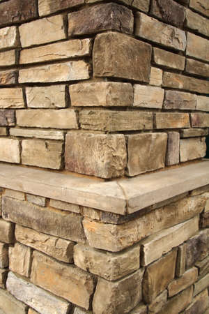 Close up brick column wall outside.の写真素材