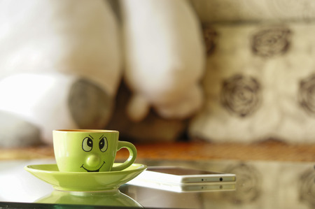 Coffee, Cup, cute, decorative, mischievous smile, grimace, communication, electronicsの写真素材