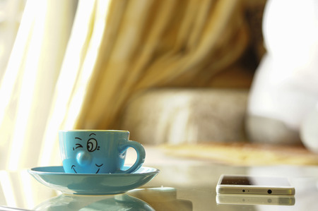 Coffee, Cup, cute, decorative, mischievous smile, grimace, communication, electronicsの写真素材