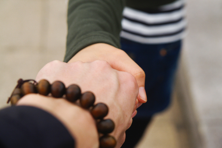 Couple holding handsの写真素材