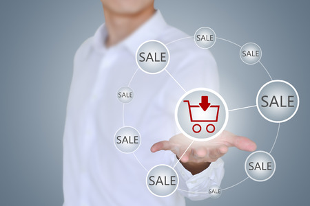 Online shopping business concept showing shopping cart and selectingの写真素材
