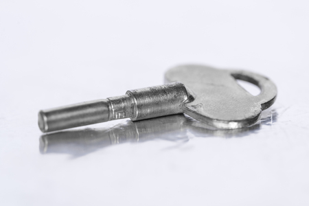 Skeleton key on a white backgroundの写真素材