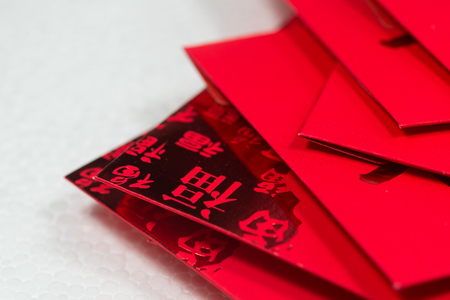 Red envelopes on white backgroundの写真素材