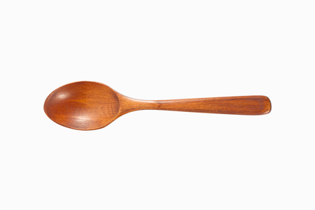 Wooden spoon isolated on white backgroundの写真素材