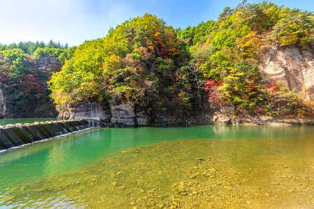 Autumn lake scenery in the township.の写真素材