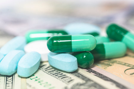Pills on the background of dollar bills. The concept of expensive medicineの写真素材