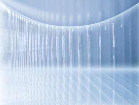 abstract blue background with some smooth lines in it and some reflectionsの写真素材