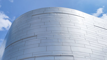 Detail of the facade of a modern office building with blue sky