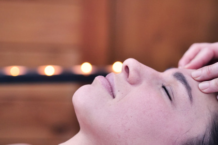 Close up of a beautiful woman in a wellness center. Concept of: spa, relaxation, rest, massageの写真素材