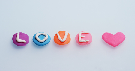 word "love" done in a creative and artistic as children. Concept of research, protected sites, creativity and colorの写真素材