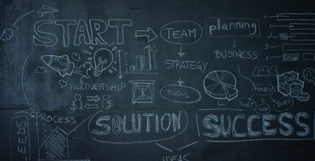 graph of success on a black board, on a black background. Concept: career growth, growth chart,...